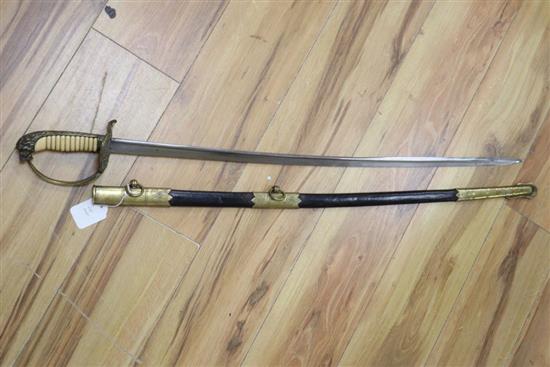An early 20th century Naval officers sword, curved single etched blade, 78cm, scabbard and hilt stamped 836, overall 97cm